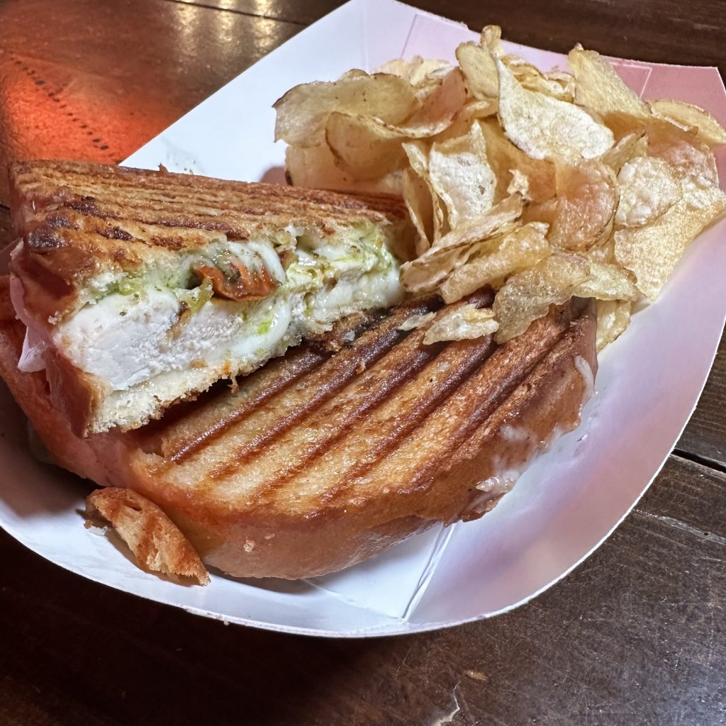 Raleigh Rooster grilled chicken panini sandwich in Downtown Raleigh